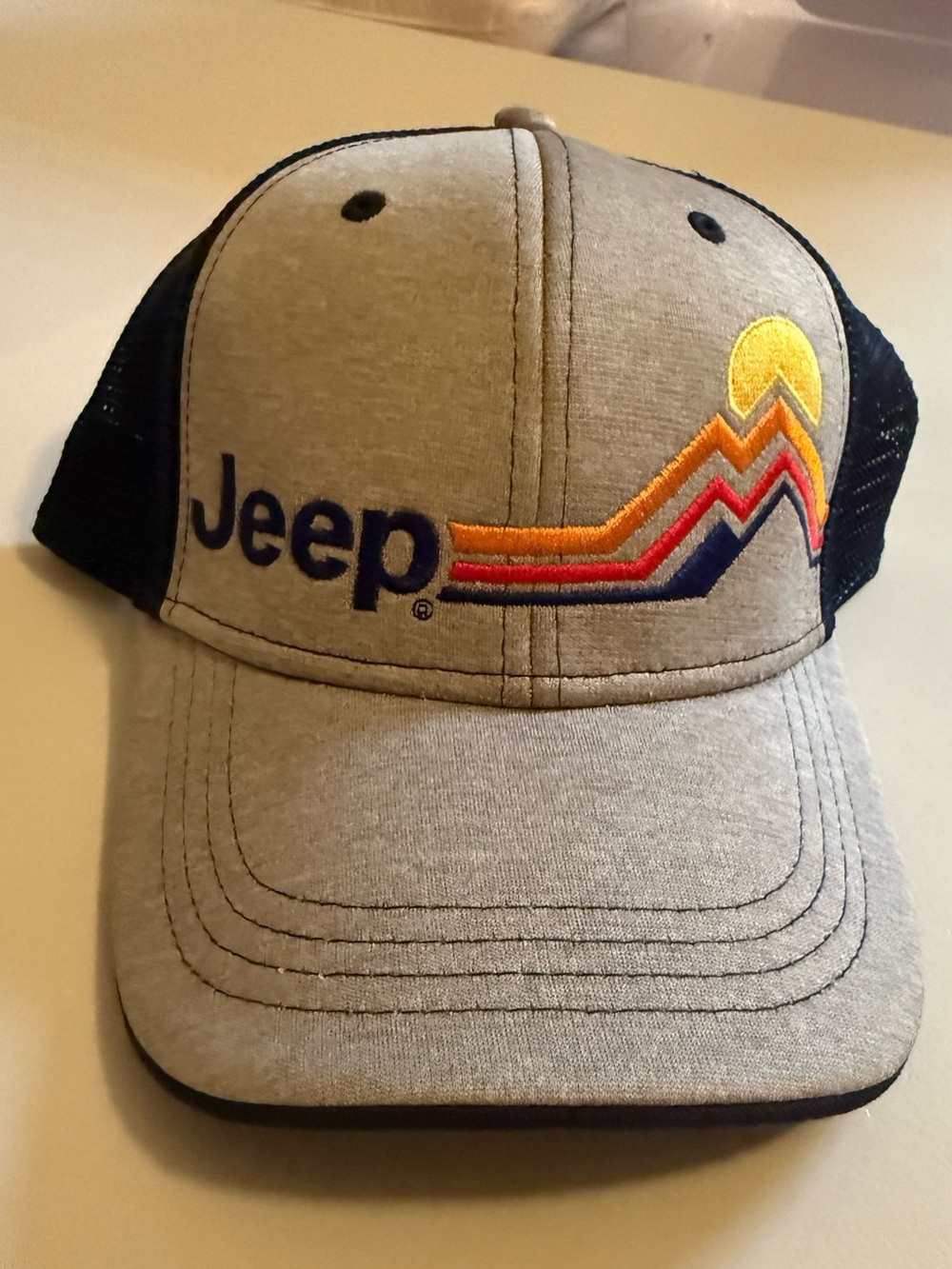 Jeep Gray and navy blue Trucker Hat with Multicolor Mountain Embroidery